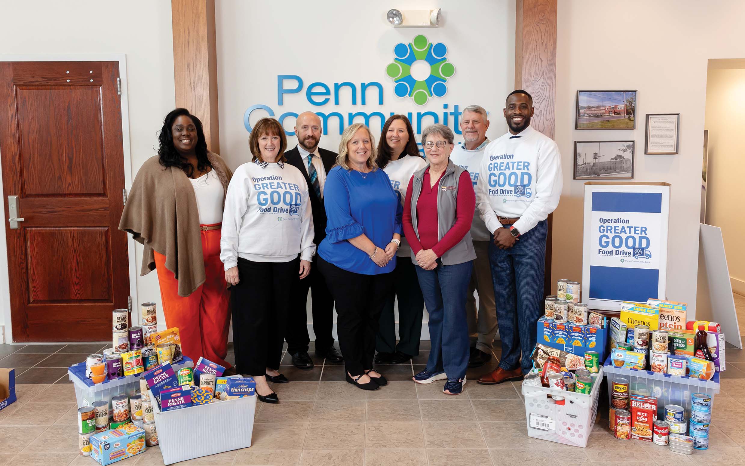 Penn Community Bank staff with representatives from New Bethany, the Keystone Opportunity Center, the Bucks County Opportunity Council and Manna on Main Street